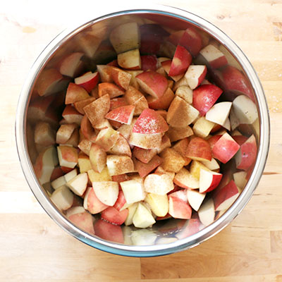 Cut apples in instant pot liner to make homemade no peel applesauce