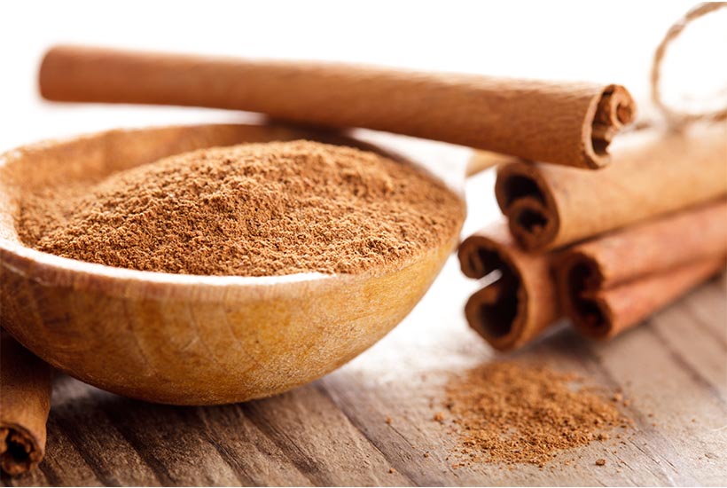 Ground cinnamon and sticks for adding flavor to homemade no peel applesauce. 