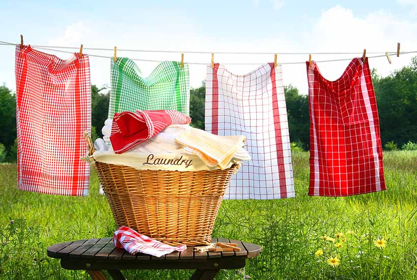 Drying towels on a clothes line outdoors. 